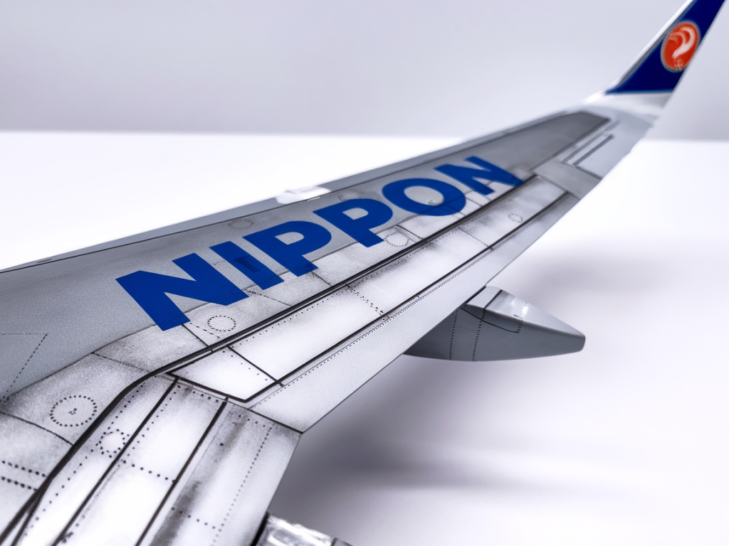 Peindre un métal brossé réaliste sur aile d'avion nippon au 1/48 avec aérographe : réglages, masques et vernis